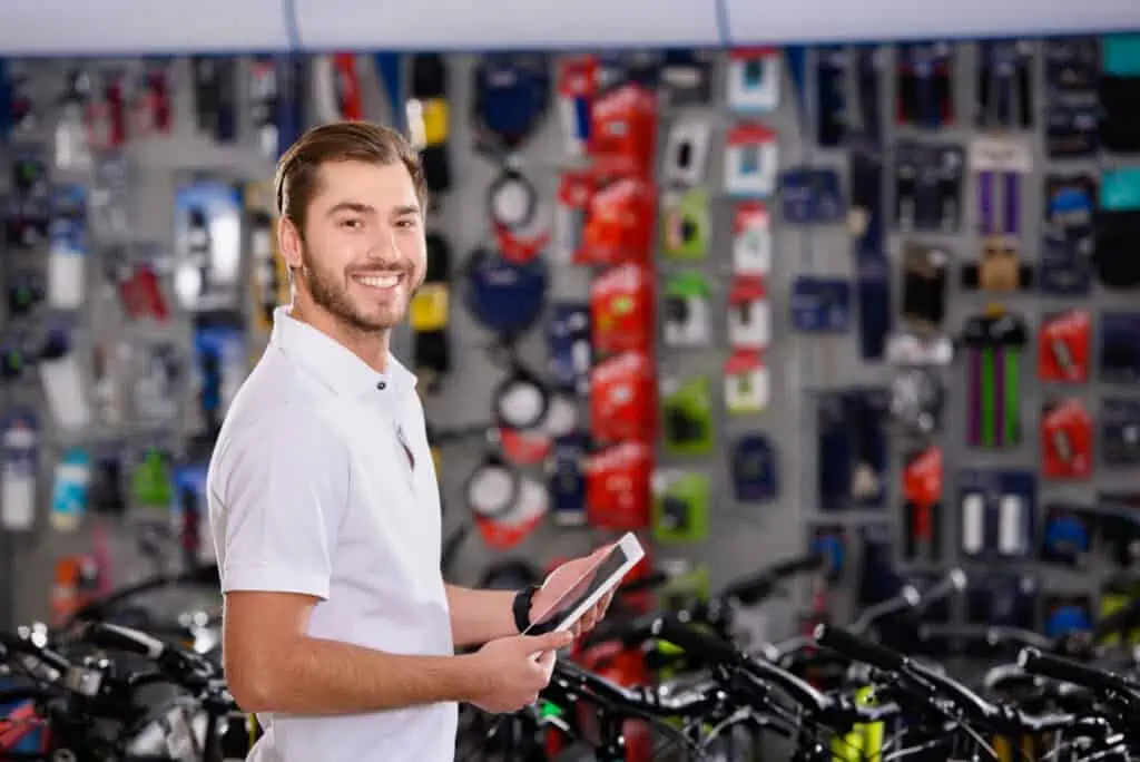 Man preparing to give professional fitting for Best male bike saddle