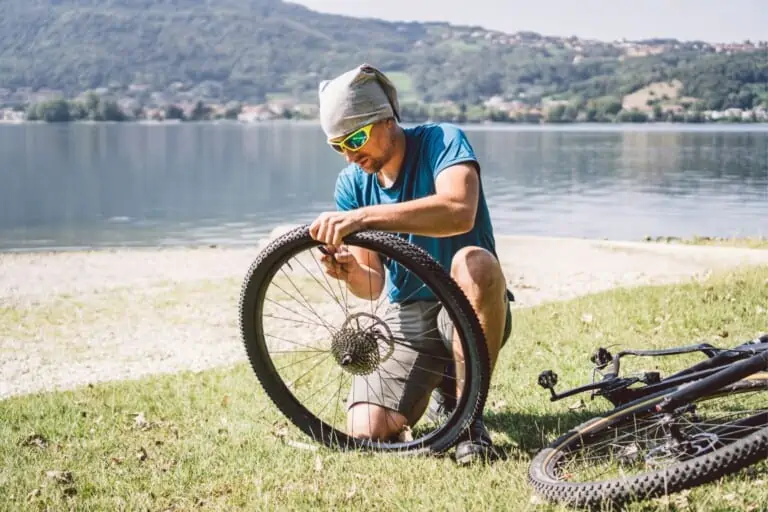 Man showing how do you fix a bike tube